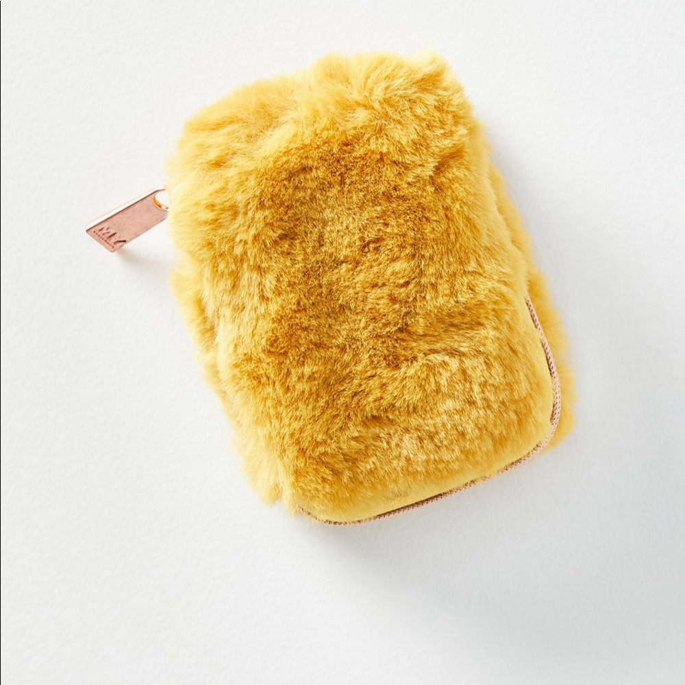 Anthropologie earbud and AirPod holder. Sold out.